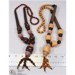 LOT OF TWO WOOD NECKLACES, YELLOW AND BROWN