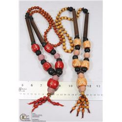 LOT OF TWO WOOD NECKLACES, RED AND YELLOW