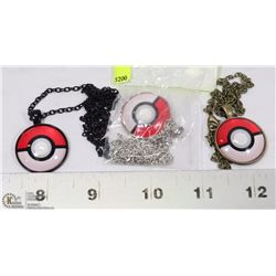 LOT OF THREE POKE BALL PENDANTS ON CHAINS