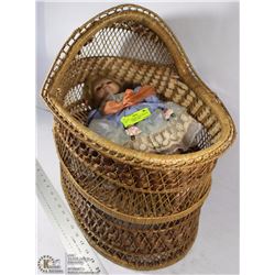 WICKER BASSINET WITH 1986 DOLL WITH EYES THAT OPEN