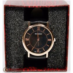 BOAMIBO WATCH WITH BLACK STRAP.