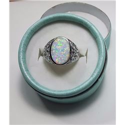#19 - WHITE OVAL FIRE OPAL RING