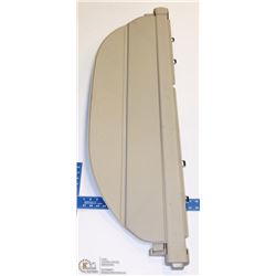 INSIDE VEHICLE CARGO COVER , OPENS TO ABOUT 2'