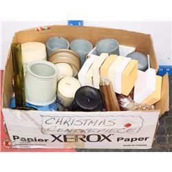 BOX OF NEW CANDLES AND CANDLE HOLDERS.