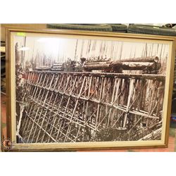 VINTAGE FRAMED PRINT OF TRAIN TRANSPORTING LOGS