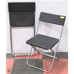PAIR OF BLACK FOLDING RESIN CHAIRS