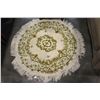 Image 1 : ROUND FRINGED AREA CARPET