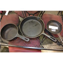 TWO JAPANESE CAST IRON FRY PANS AND CANADIAN NUMBER 6 CAST IRON PAN