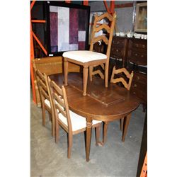 OAK DINING TABLE WITH 2 LEAFS AND FIVE CHAIRS