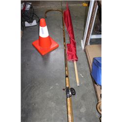 FISHING ROD WITH REEL FLAG ON POLE AND STAGE HOOK AND PILAR