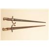 Image 1 : Lot of 2 French bayonets with metal sheaths. Est.: $100-$200.