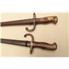 Image 2 : Lot of 2 French bayonets with metal sheaths. Est.: $100-$200.
