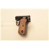 Image 1 : Colt .25 caliber semi-automatic pistol, 2 barrel, blued finish, checkered