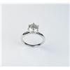 Image 1 : Brilliant 14 karat white gold solitaire featuring a round Diamond