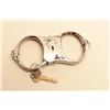 Image 1 : Scarce Beans Giant handcuffs with key; circa 1887. In working