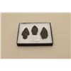 Image 1 : Riker case with 3 arrowheads and consignor note: Alaskan Eskimo/Yupik