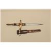 Image 2 : Arabian Touareg dagger, approximately 18 overall, brass mounted, with decorated