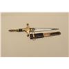 Image 5 : Arabian Touareg dagger, approximately 18 overall, brass mounted, with decorated