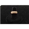Image 1 : 14k yellow gold ladies ring set with 10 roped in