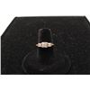 Image 1 : One ladies 3 diamond step ring in 14k yellow gold.