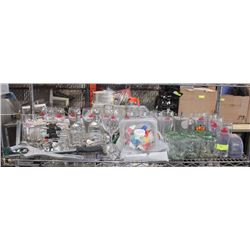 SHELF FULL OF GLASSWARE AND BAR ACCESSORIES