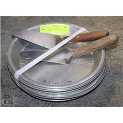 STACK OF TEN 9" PIE PLATED WITH 2 LIFTERS.