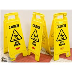 LOT OF THREE RUBBERMAID WET FLOOR SIGNS