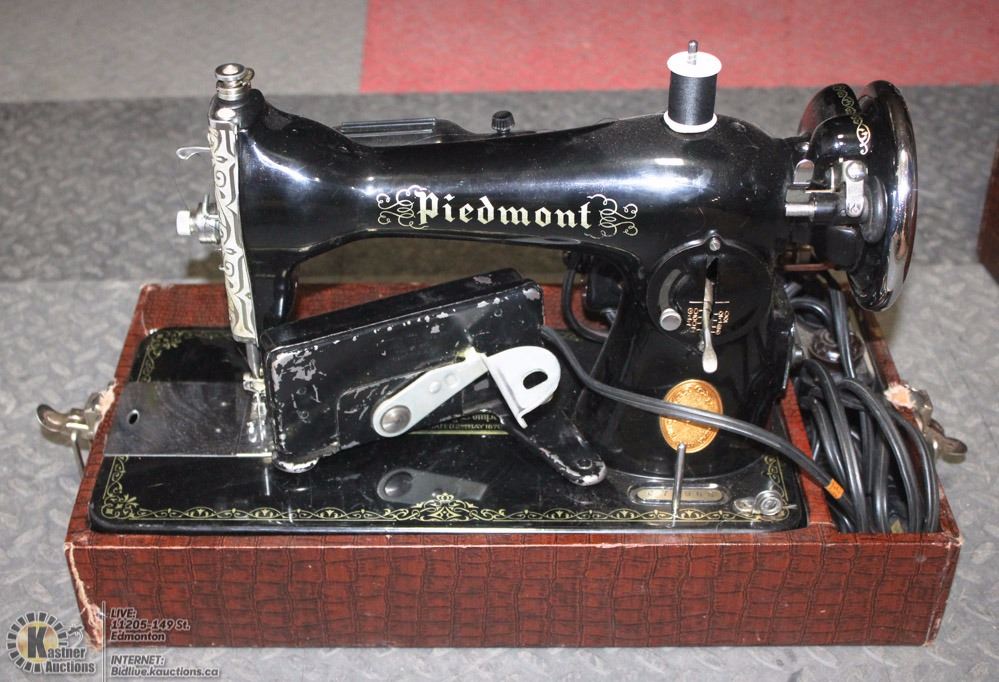 VINTAGE PIEDMONT SEWING MACHINE WITH FOOT PEDAL.