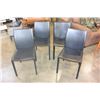 Image 1 : FOUR BLACK LEATHER DINING CHAIRS