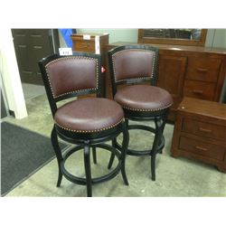 PAIR OF OX BLOOD LEATHER SWIVELLING BAR CHAIRS