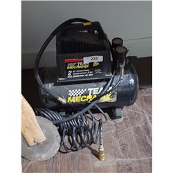 AIR COMPRESSOR