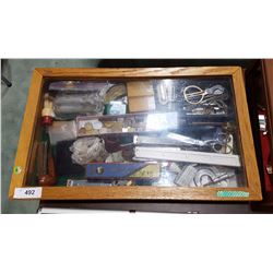 DISPLAY CASE W/WORLD COINS, HARMONICAS, PIPES ETC