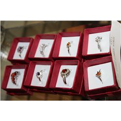 LOT OF EIGHT DINNER RINGS