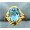 Image 1 : Blue Topaz and Diamond Ring