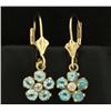Sky Blue Topaz and Diamond Flower Earrings