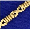 Image 2 : Italian Made 7 Inch "X" Link Designer Bracelet in Yellow Gold