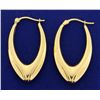 Image 1 : Elongated Hoop 14k Gold Earrings