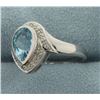 Image 2 : Diamond and Blue Topaz Ring