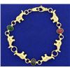Image 1 : Vintage Italian Made Emerald, Ruby, and Sapphire Elephant Bracelet