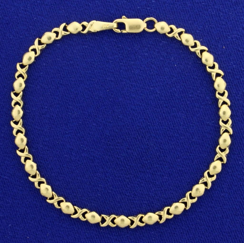Hugs and Kisses Gold Bracelet