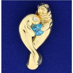 Manatee Pendant with Blue Topaz and Diamonds in 14k Gold