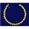 Image 1 : 7 Inch Heart Link Bracelet in 14k Gold