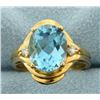 Image 1 : Blue Topaz and Diamond Ring