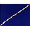 Image 1 : 14k Yellow and White Gold Diamond Bracelet