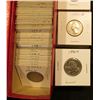 Image 3 : 9" x 2" x 2" Coin Stock Box full of coins, some foreign but mostly quarters dating 1966-1997. At lea