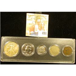 Snaptight case containing 1905 Indian Cent, 1910 Liberty Nickel, 1977 S Proof Dime, 1962 P Proof Was