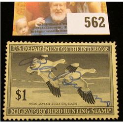 1947 RW14 Federal Migratory Bird Hunting $1 Stamp, signed and obviously used for hunting.