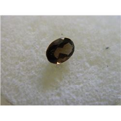 GEMSTONE - OVAL FACETED SMOKEY TOPAZ - 7.0 X 4.9 X 3.4 mm - ~  0.83CT
