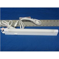 New G.E slim  line plug in florescent light