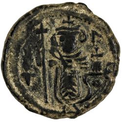 ARAB-BYZANTINE: Standing Emperor type, ca. 680s, AE fals (4.88g), Dimashq, ND. VF